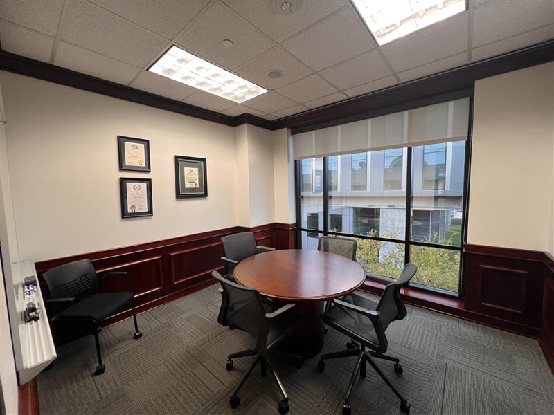 Conference room with a table and 4 chairs